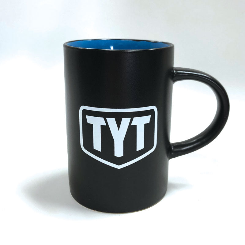 Logotipo del escudo TYT Taza